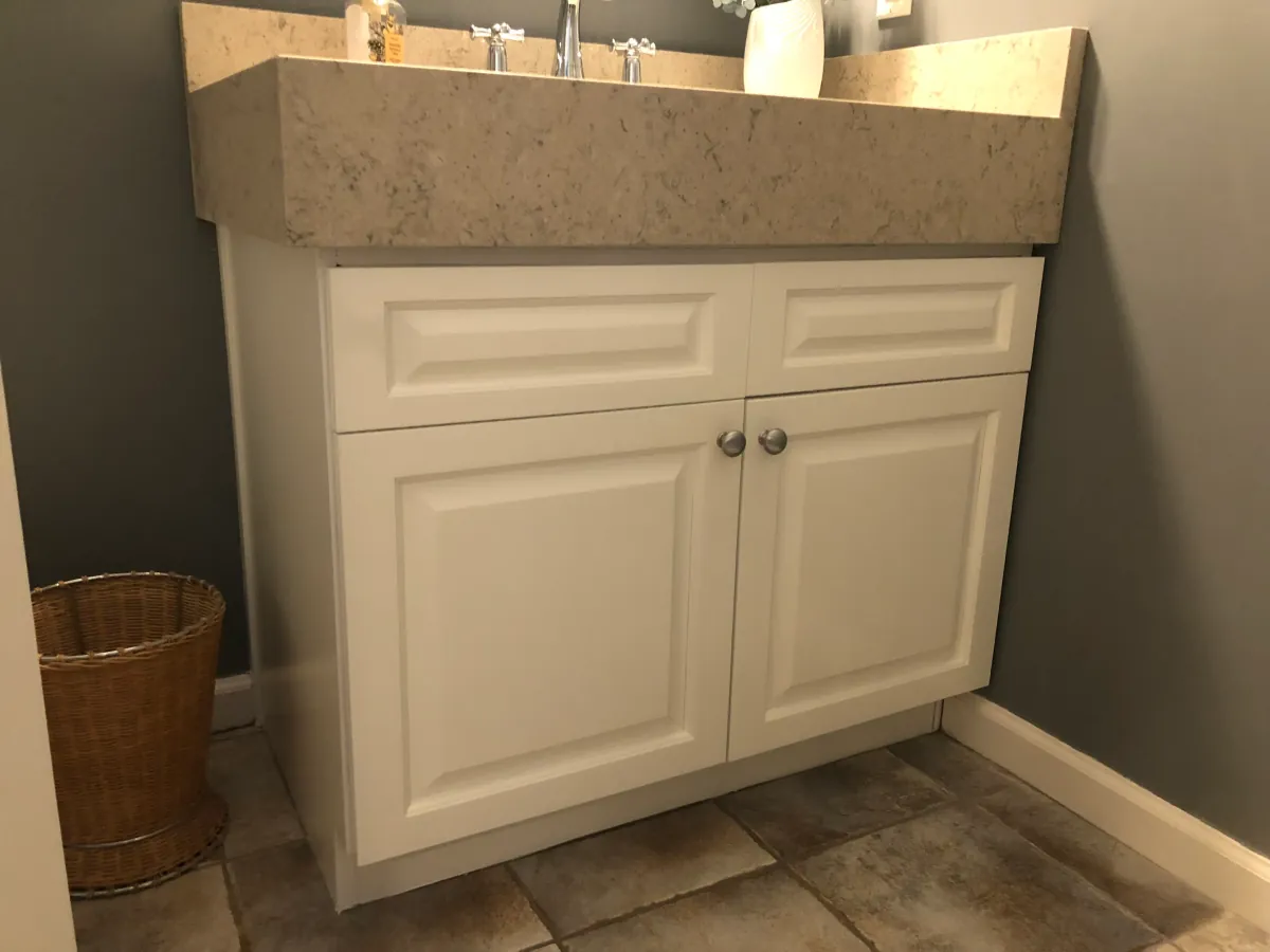 Cabinet refinishing detail — smooth sprayed finish