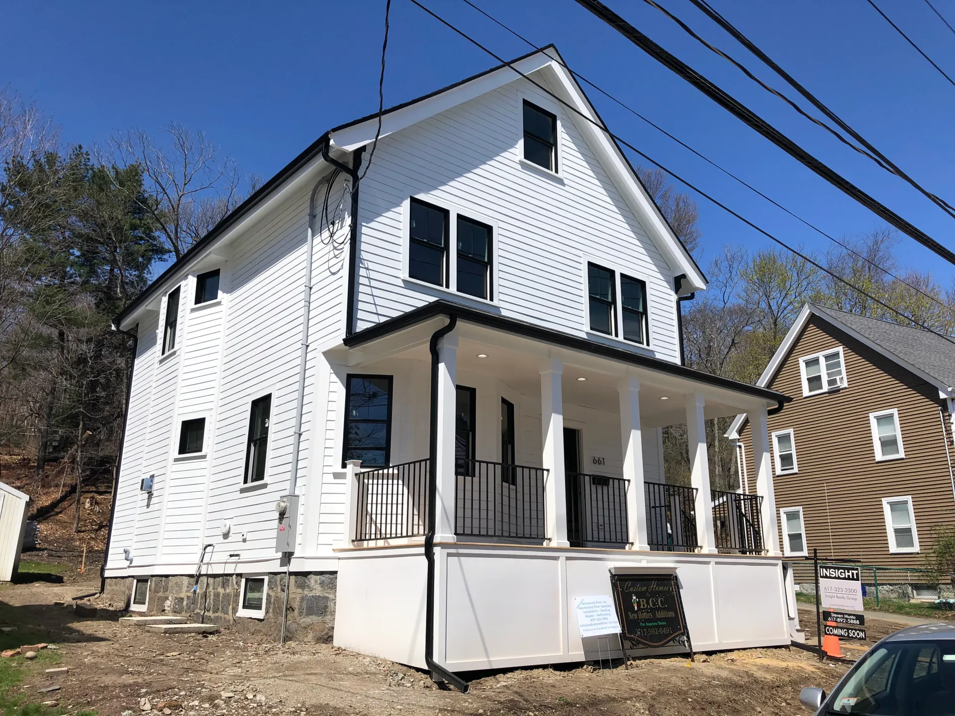Exterior painting project in Massachusetts — freshly finished siding