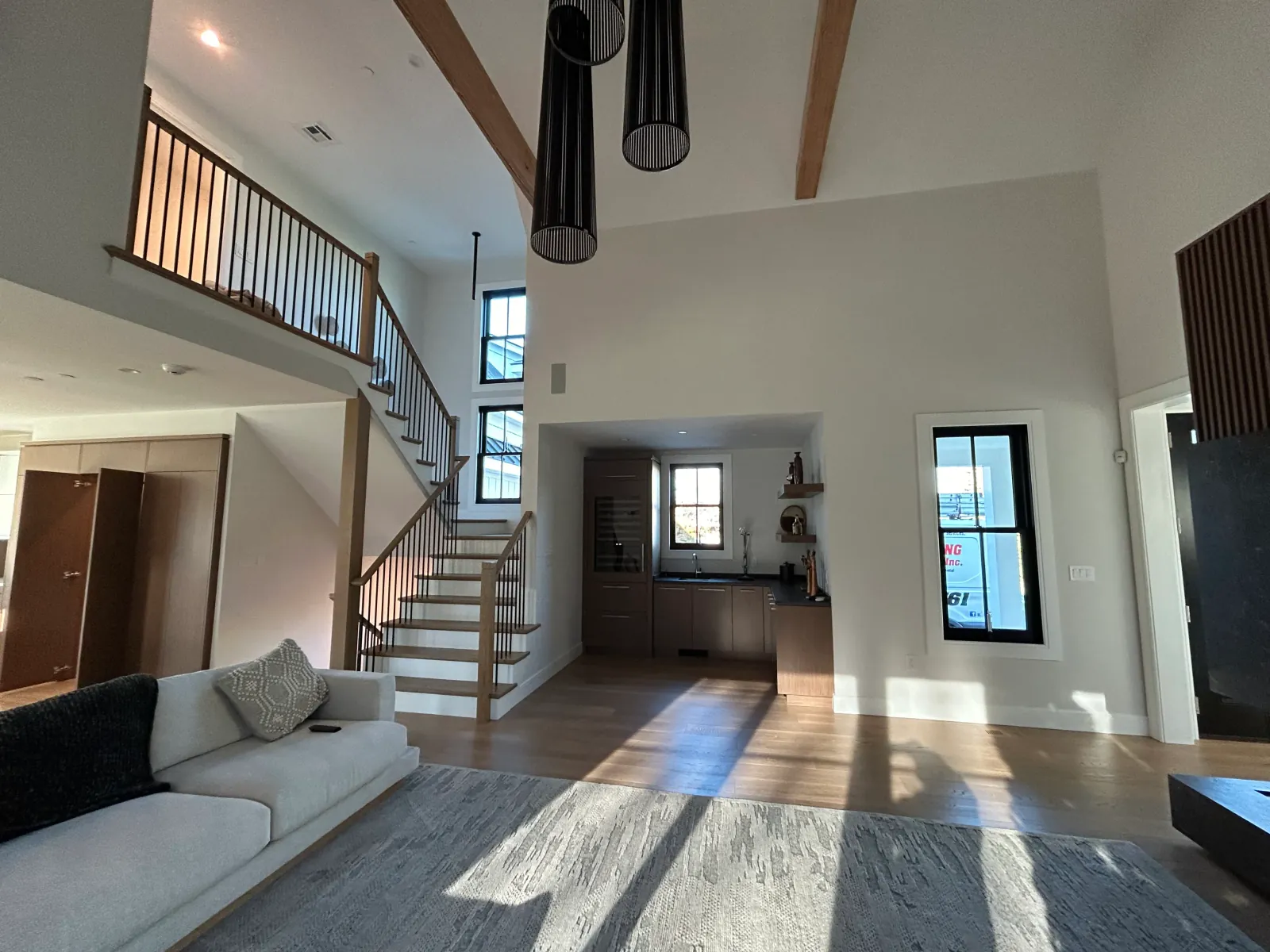 Full home interior painting case study in Ashland, MA — refreshed modern living room ready for listing